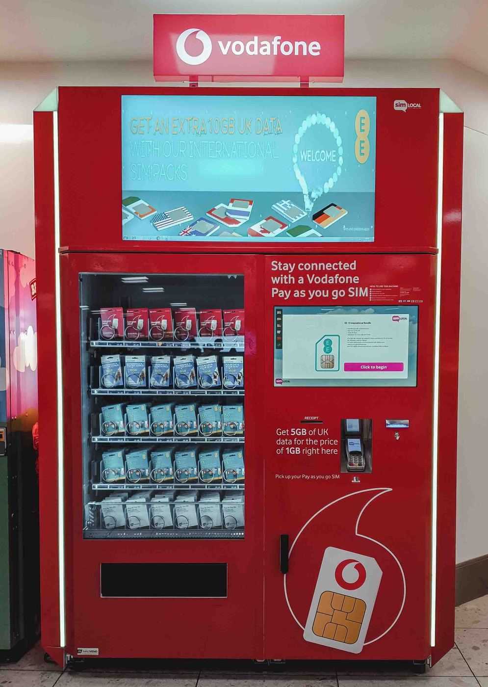 Vodaphone vending machine at Heathrow Airport in the baggage reclaim area. 