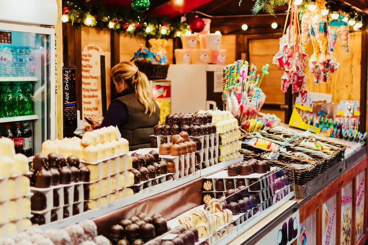 Christmas stall with chocolates, candy and sweets at the Christmas market of Leicester