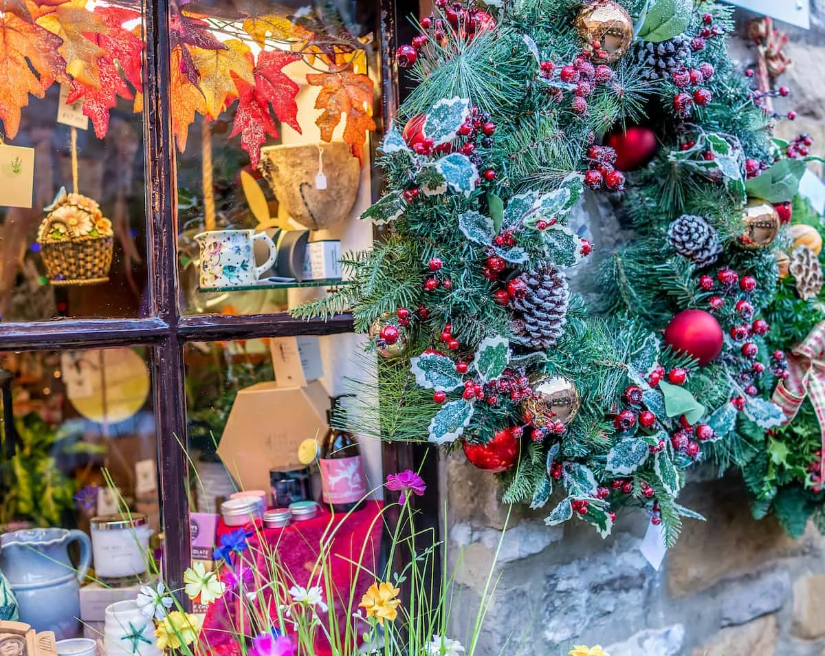 Festive and seasonal window display as Christmas time in a shop in the town of Bakewell Credit_Yackers1