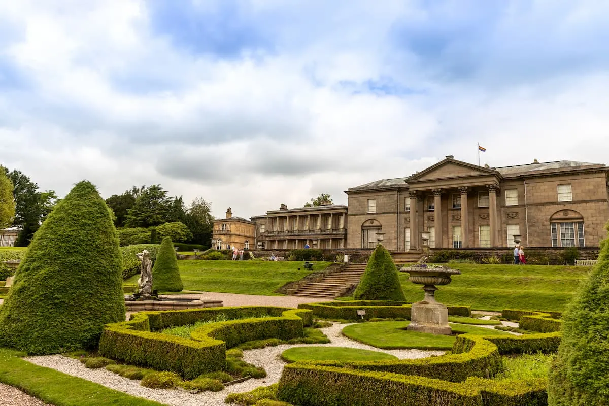 Formal garden and an historic mansion at Tatton Park in England
