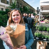 Kat holding flowers at Columbia Road Flower Market
