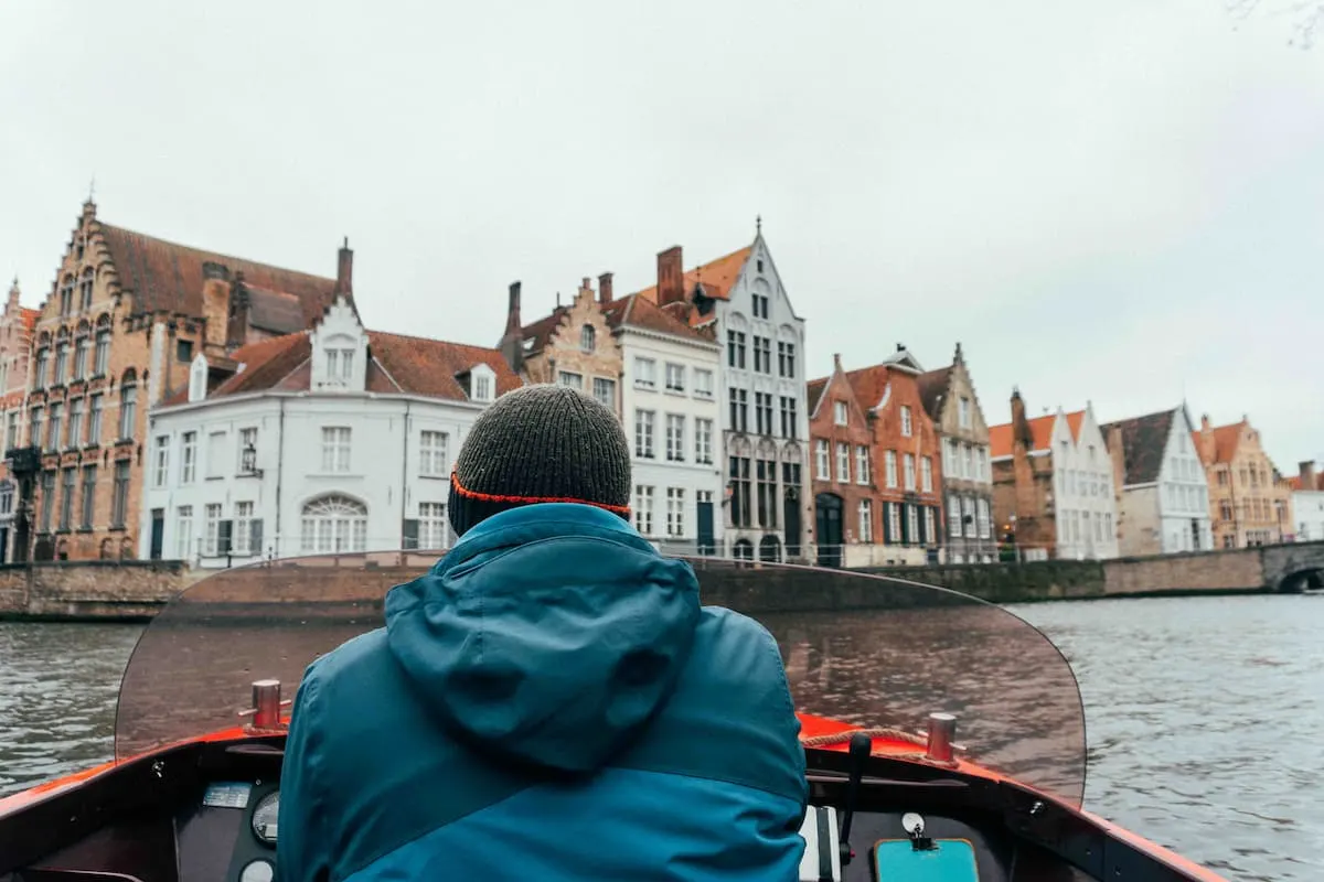 Take a canal boat tour in Bruges.