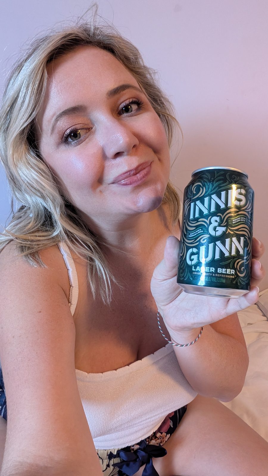 Kat holding a can of Innis and Gunn Scottish lager in Edinburgh.