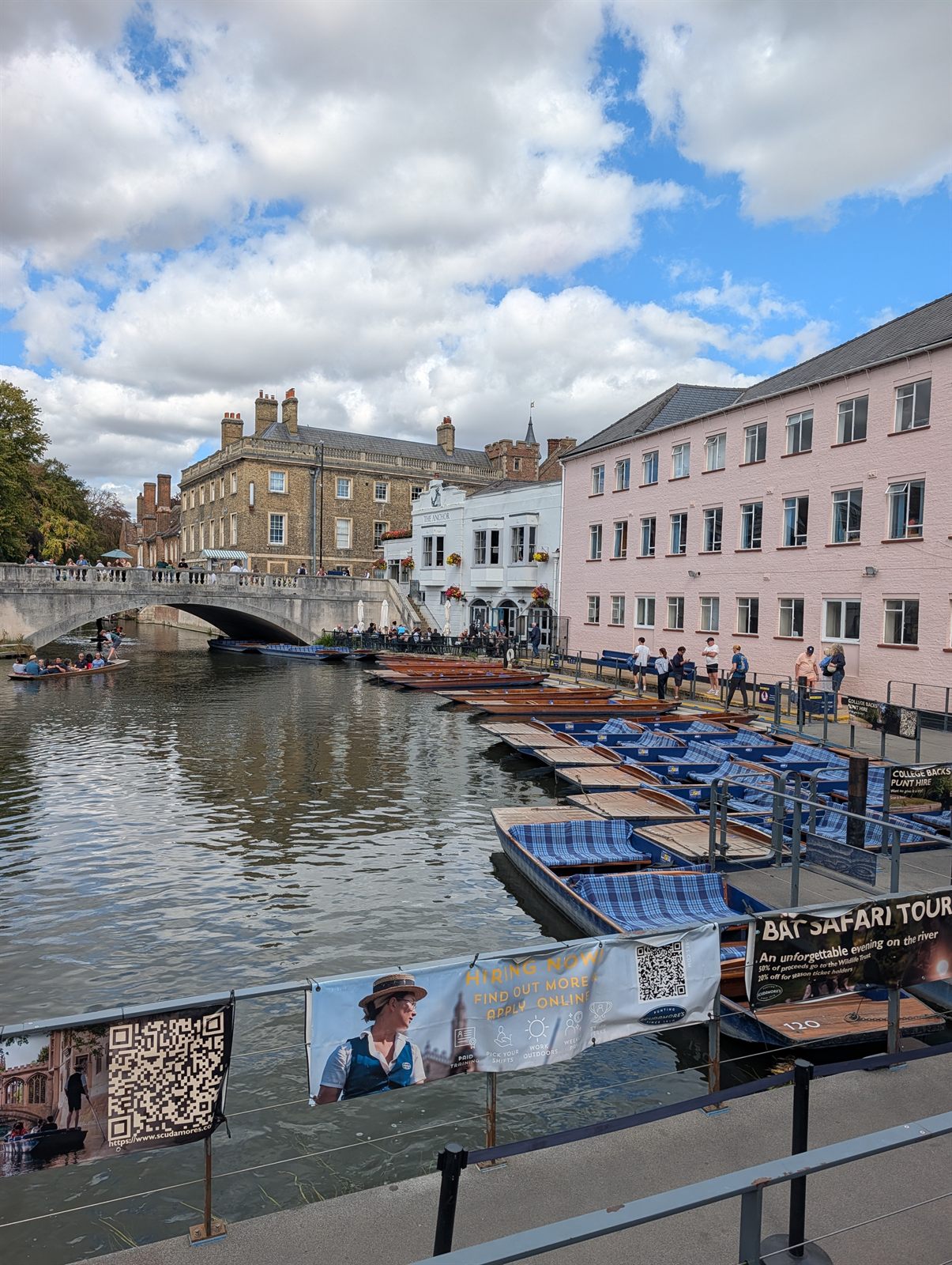 Punts for hire by Silver Street bridge and the Anchor pub, with a Scudamore's banner