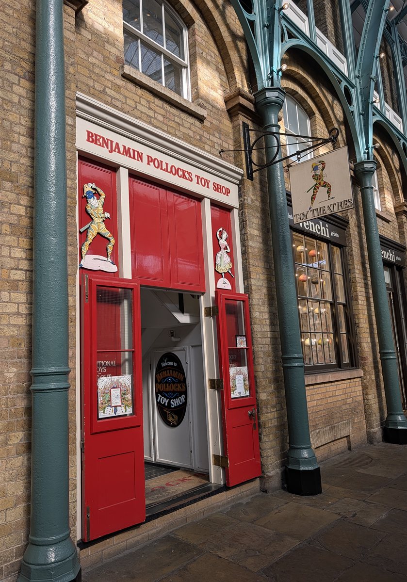 Red doors and fascia of Benjamin Pollock's Toy Shop in Covent Garden Market