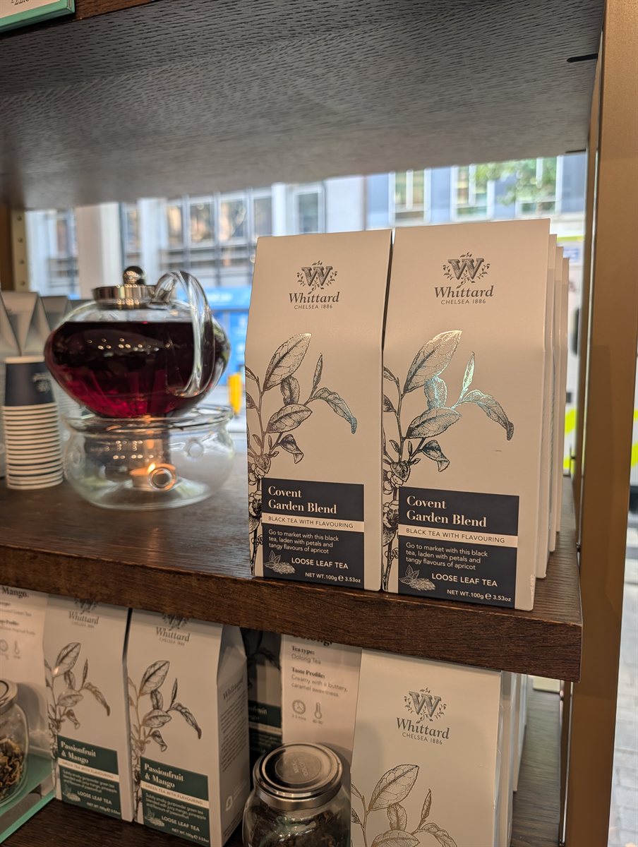 Covent Garden Blend loose leaf tea boxes beside a glass teapot at Whittard